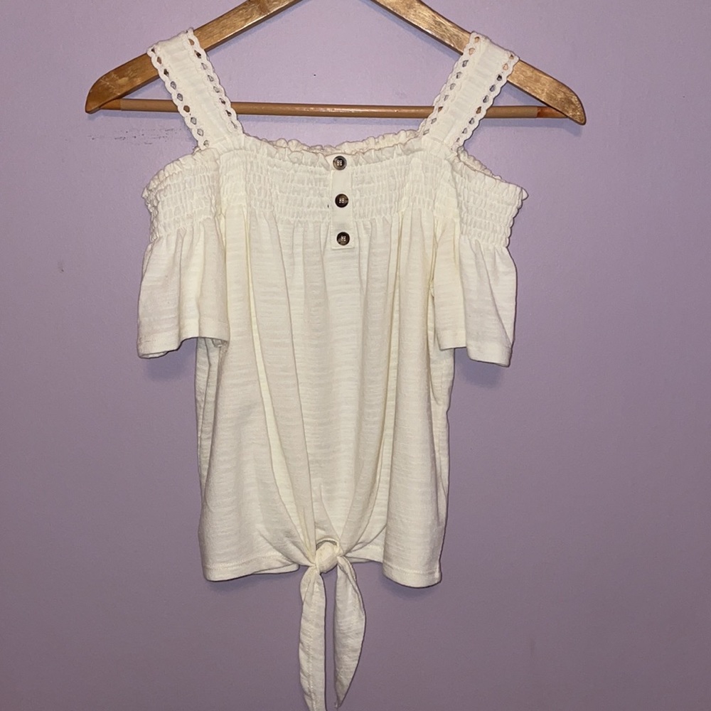 Cream colored off the shoulder too with buttons